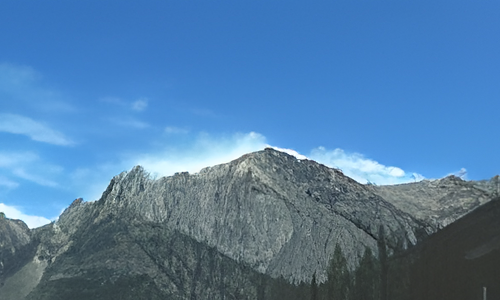 Portrait quality comparison showing the original image and the Elmony upscaled result.